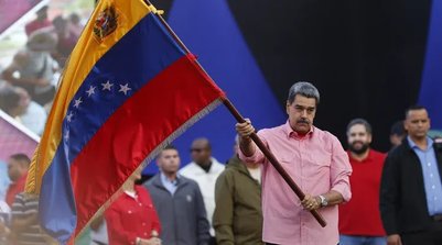Venezuela: salário mínimo permanece em US$ 0,50, sem reajuste desde 2022, e bônus do governo viram principal renda. (AFP) (Foto: Divulgação)