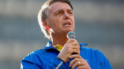 O ex-presidente Jair Bolsonaro discursa a apoiadores na Avenida Paulista (Foto: Miguel Schincariol/AFP)
