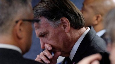Ex-presidente Jair Bolsonaro, durante julgamento no STF por suposta 'tentativa de golpe', em Brasília (Foto: Reuters/Diego Herculano)