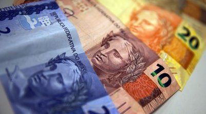 Benefício extra começa a ser pago para quem ganha um salário mínimo (Foto: MARCELLO CASAL JRAGÊNCIA BRASIL)